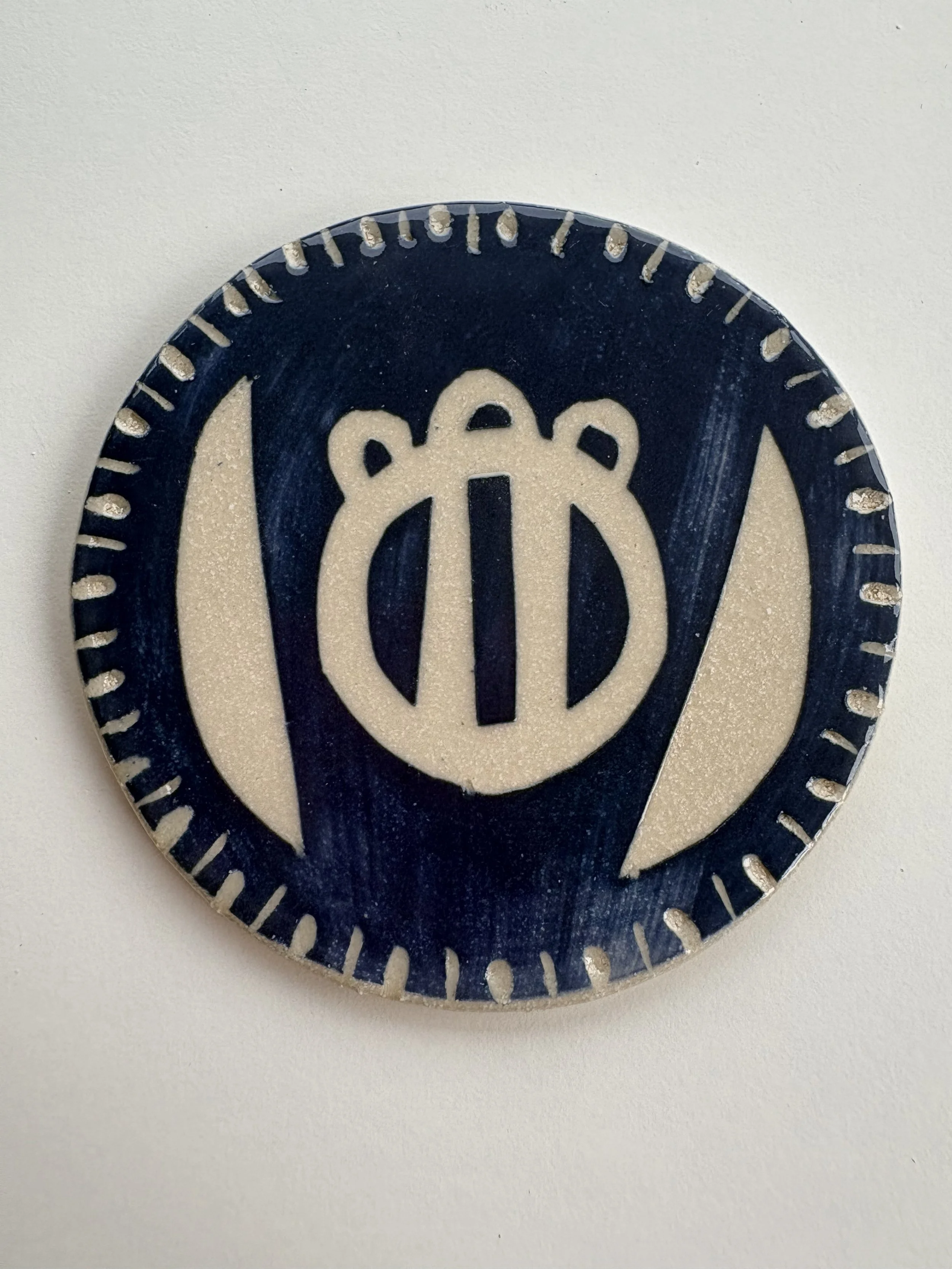 Seed Pod Motif Coaster -white on blue slip background