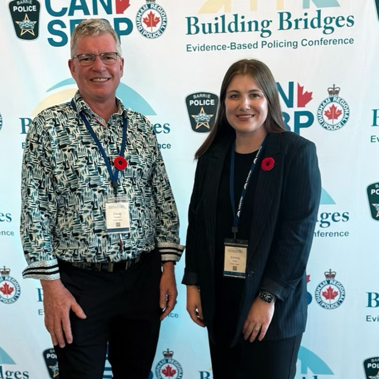 Researchers Doug Thomson and Emma Smith at the Building Bridges policing conference.