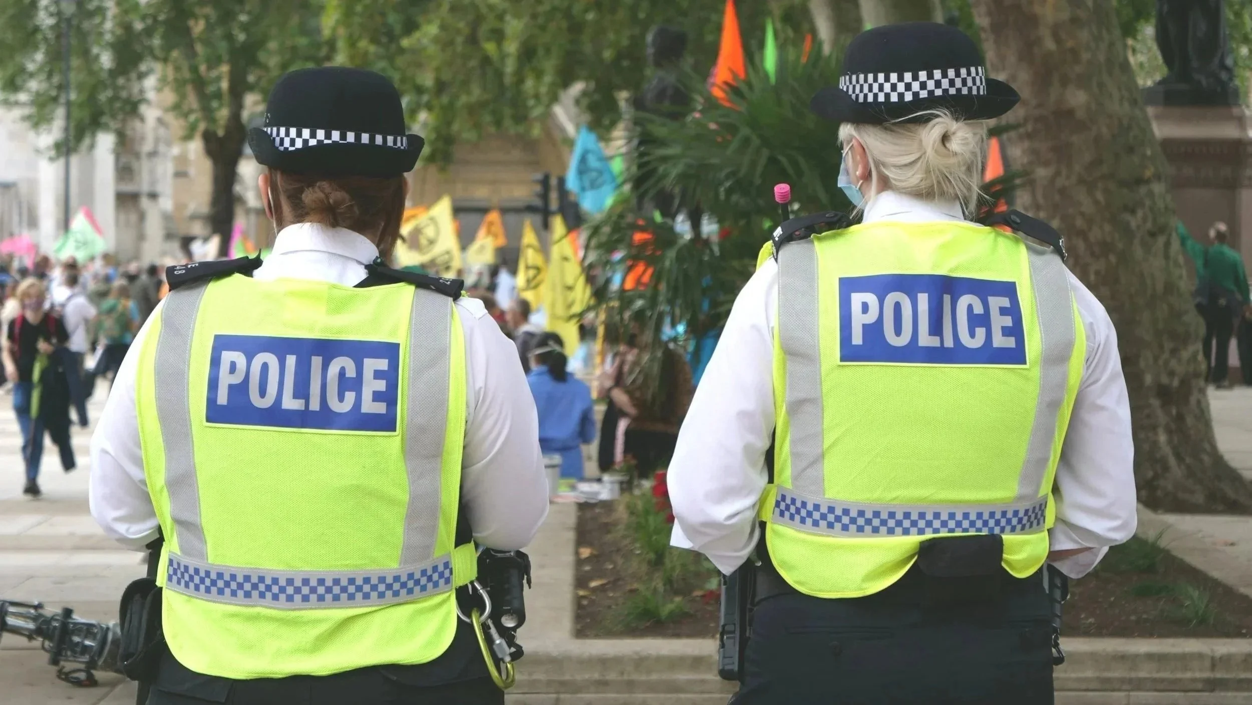 Police officers at a public event, reflecting research on crime, media, and institutional representation.