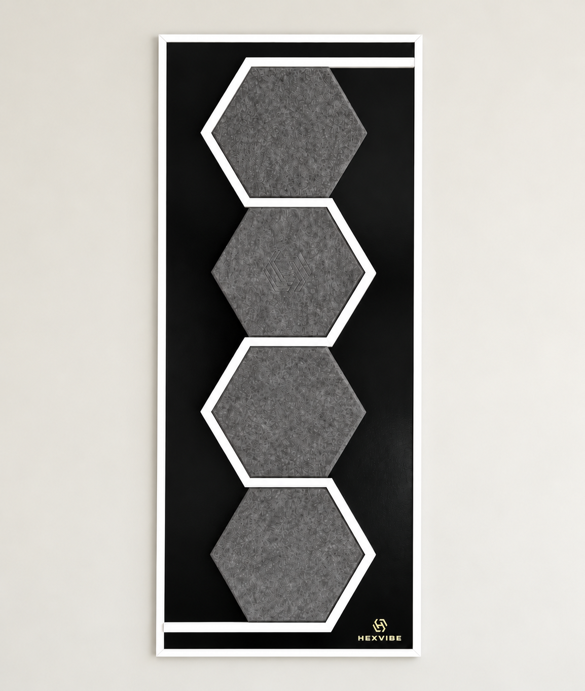 Single HexVIBE FLOW Eclipse sound-reactive LED acoustic panel with four grey hexagonal sections