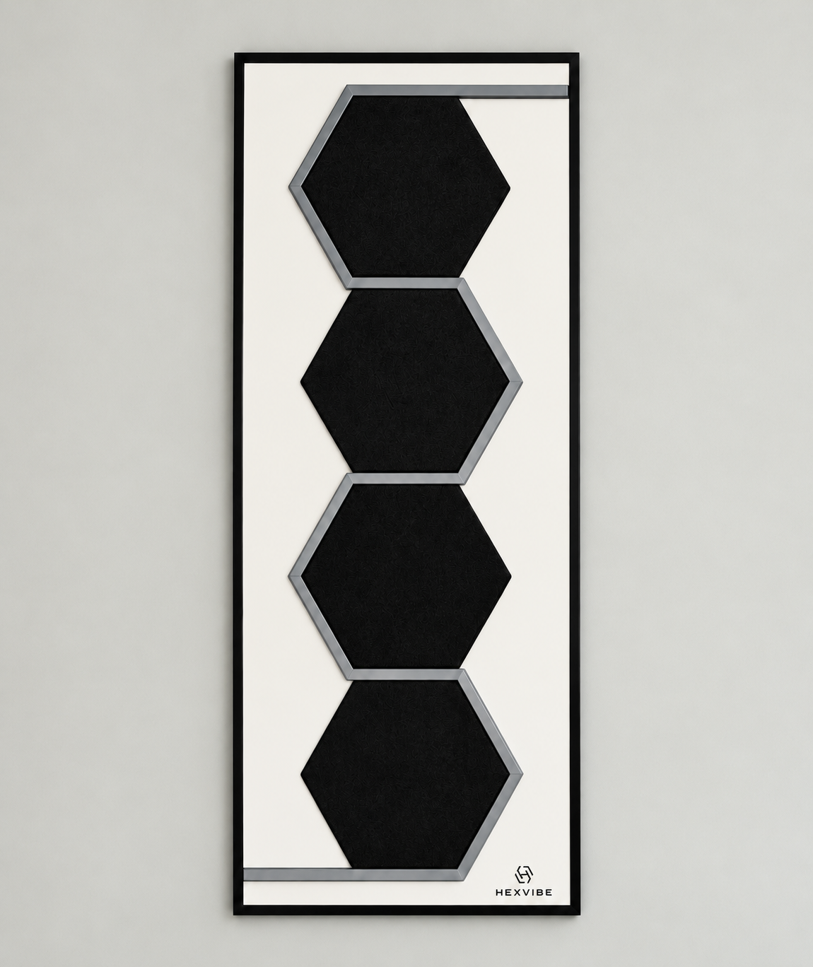 Single HexVIBE FLOW Onyx sound-reactive LED acoustic panel with four black hexagonal sections