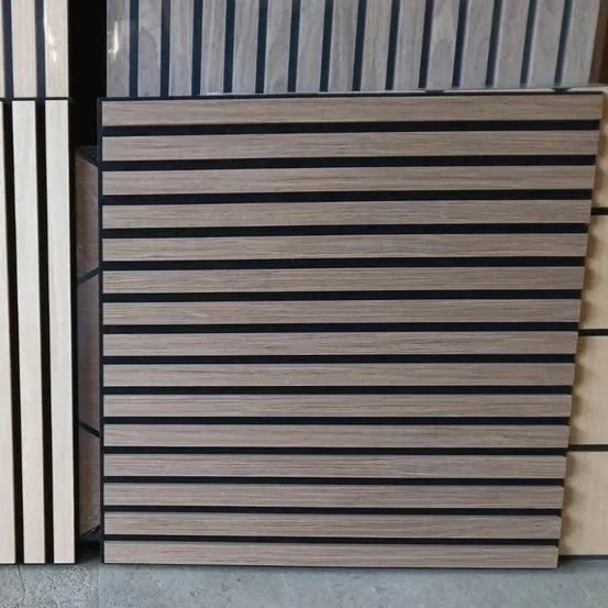 A slatted wooden panel with horizontal black stripes and a metal frame on a tiled floor.