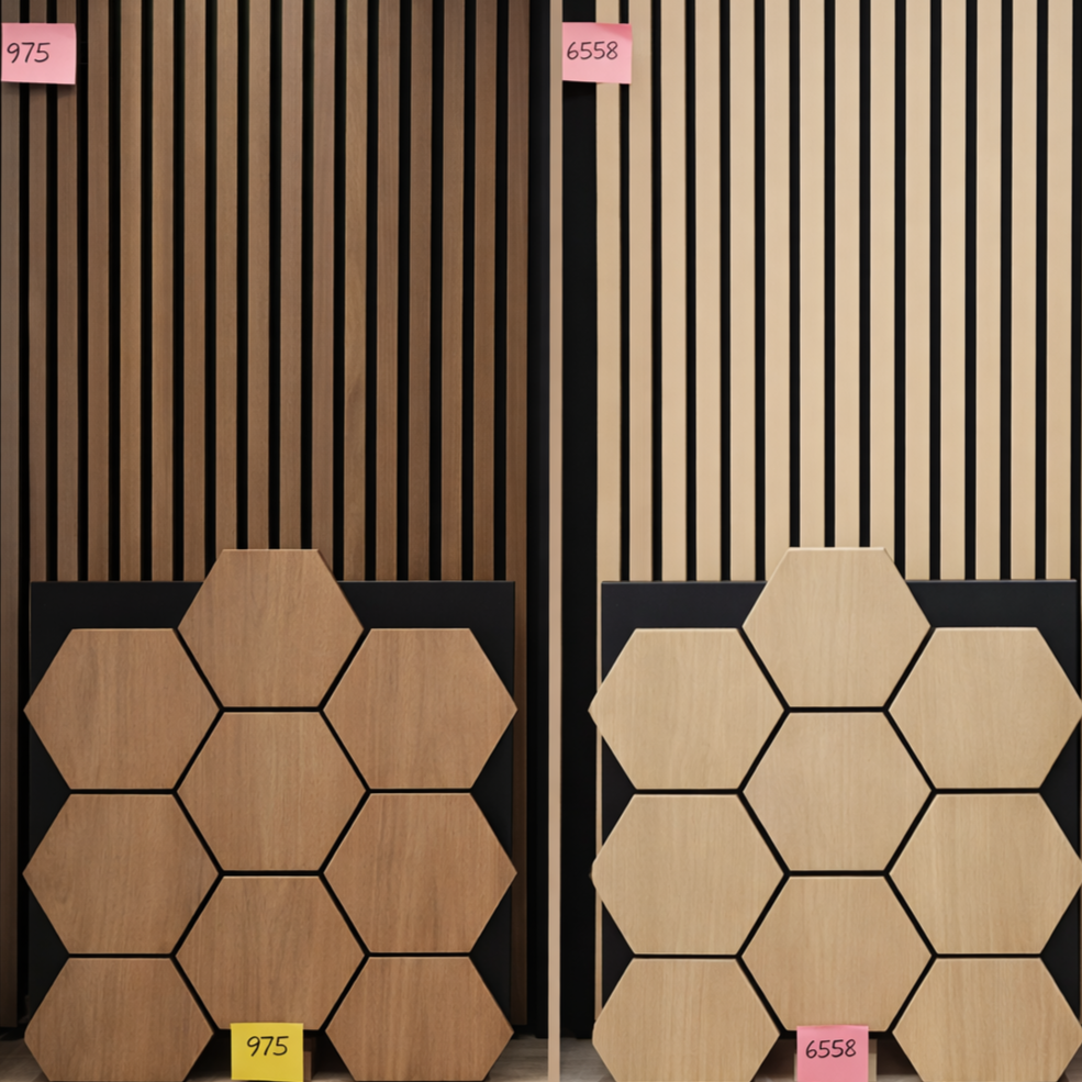 Two display panels showing wooden slat patterns with hexagonal wood pieces, one darker and one lighter, in a showroom or store. Pink and yellow price tags are visible on top and bottom of each panel.
