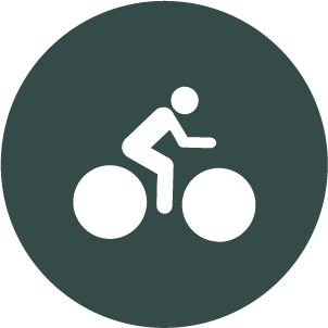 Icon of a person riding a bicycle.