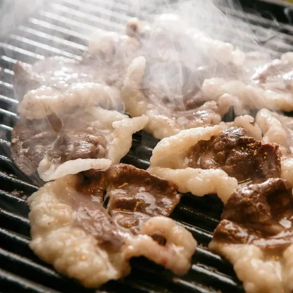 A martini cocktail with olives