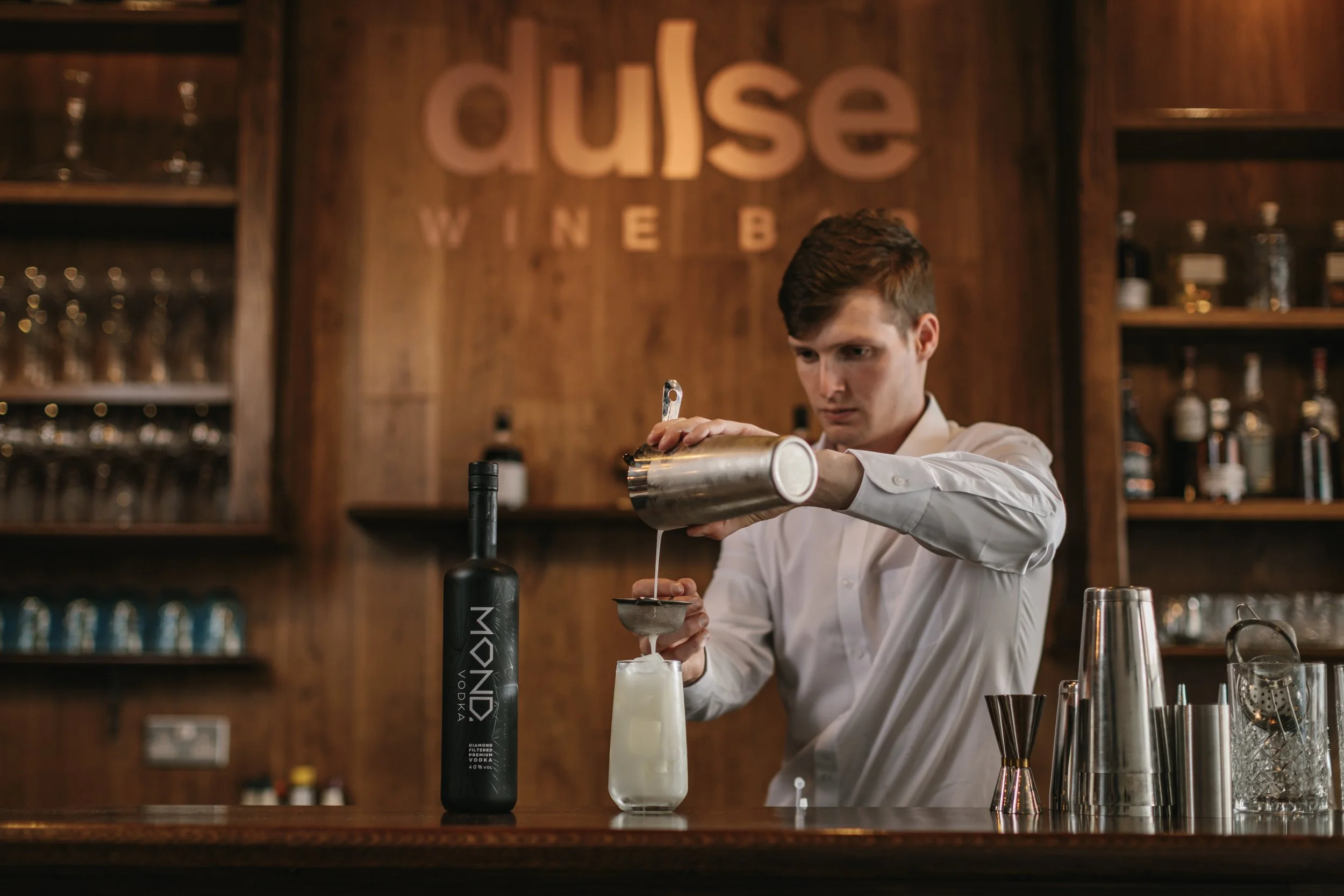 a bartender making a cocktail
