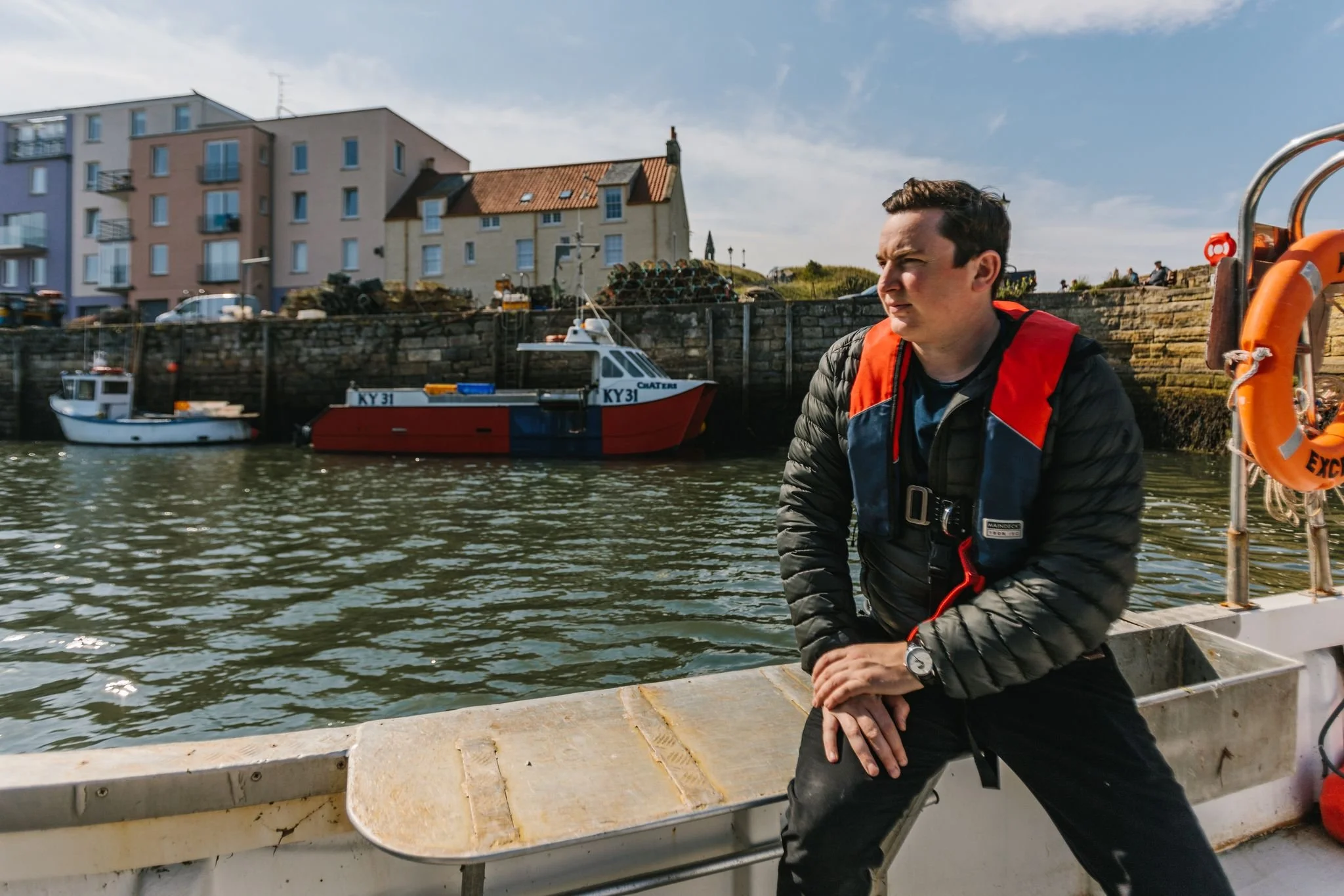 Chef Dean Banks on a fishing boat in St. Andrews Bay