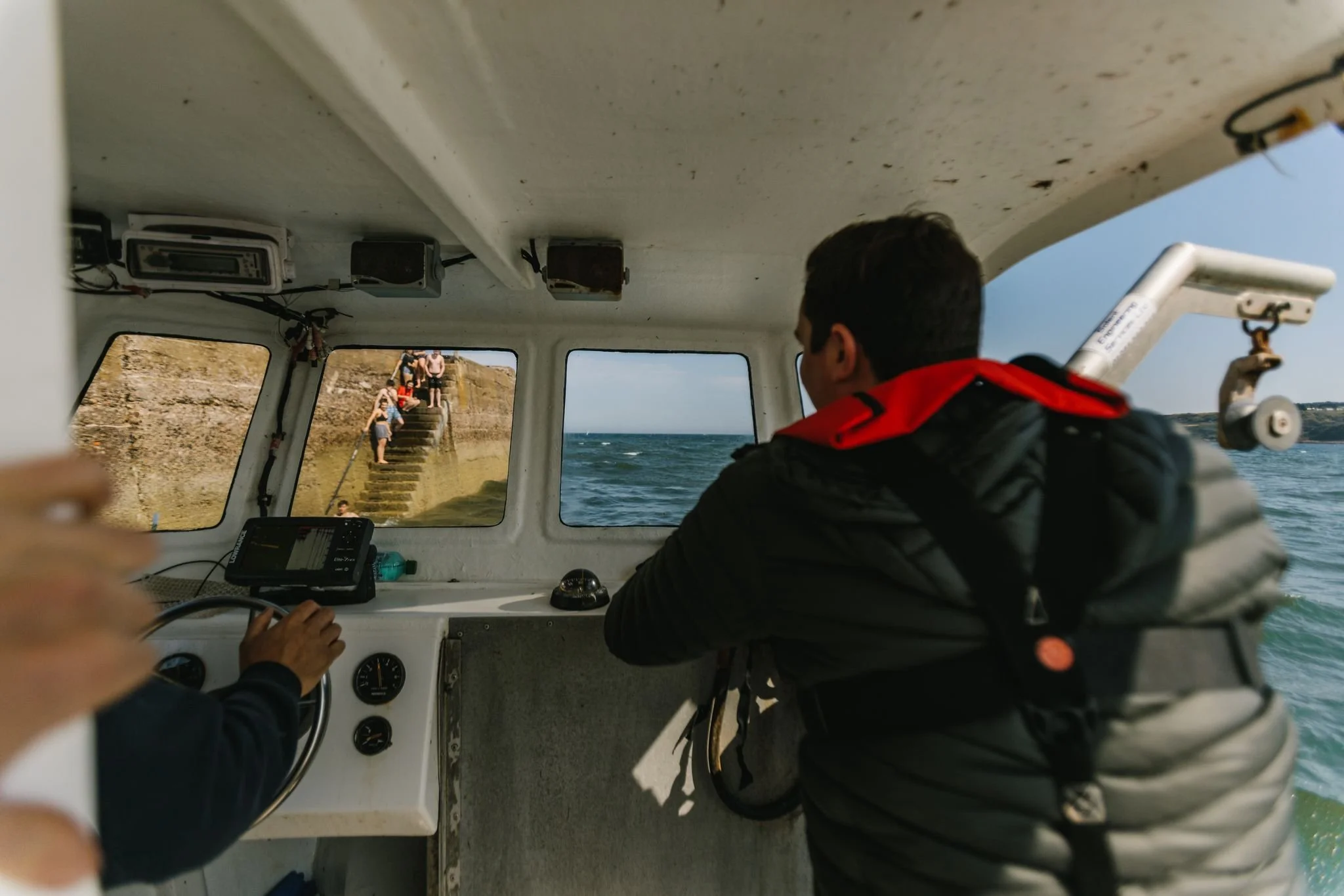 Chef Dean Banks on a fishing boat in St. Andrews Bay