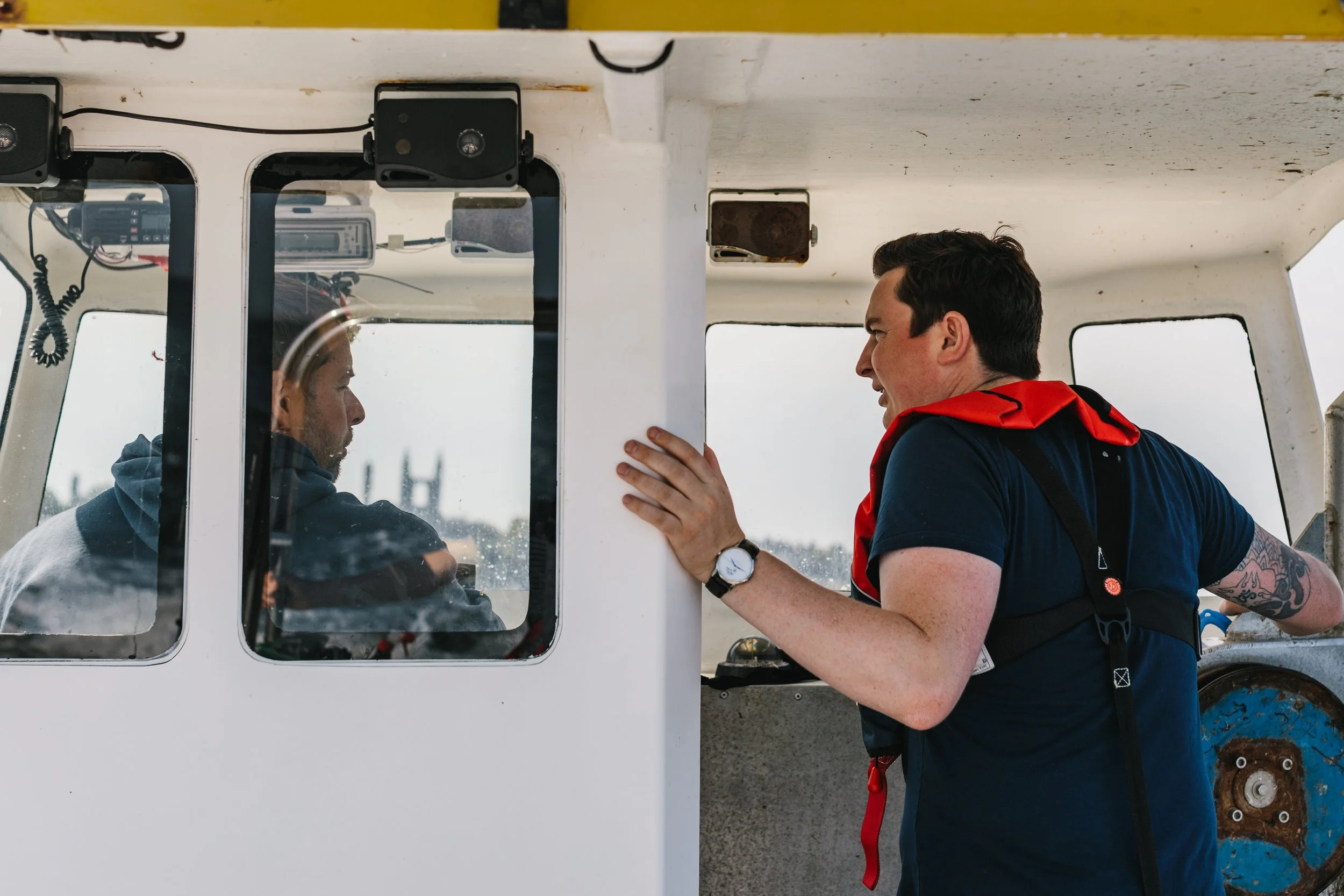 Chef Dean Banks on a fishing boat in St. Andrews Bay