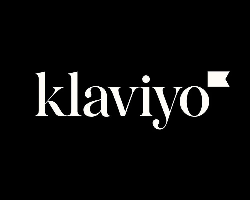 Black background with the white text 'klaviyo' and a small white flag symbol.
