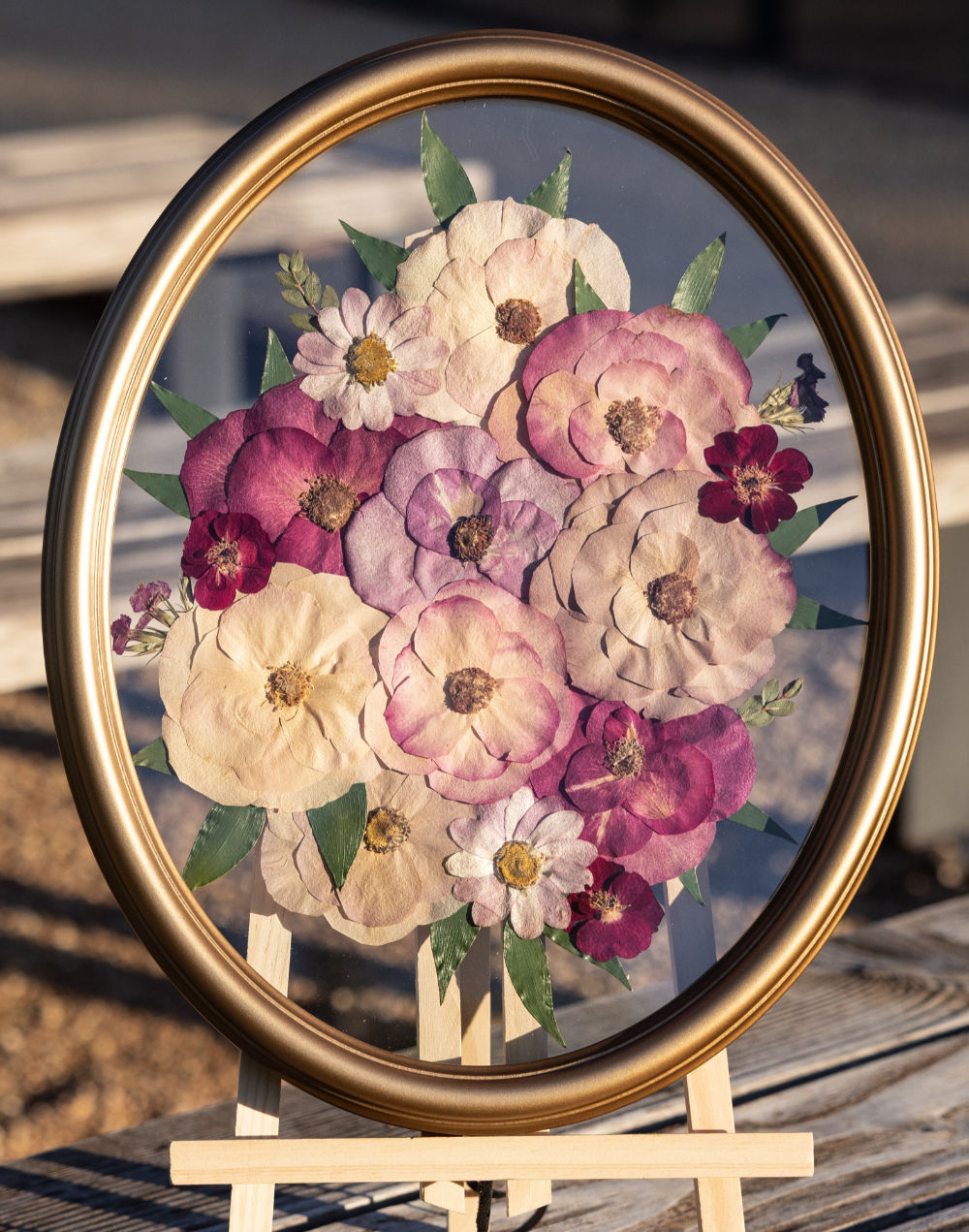 Framed and pressed wedding bouquet in gold oval frame | Floral Preservation | Austin, TX 