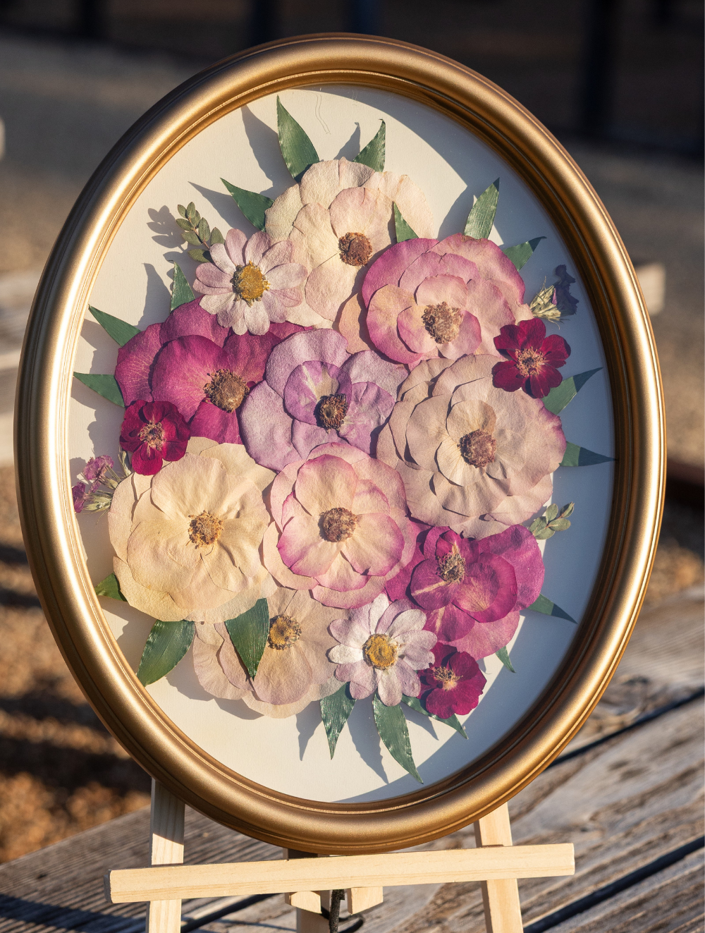Oval frame featuring pressed roses | Floral Preservation | Austin, TX