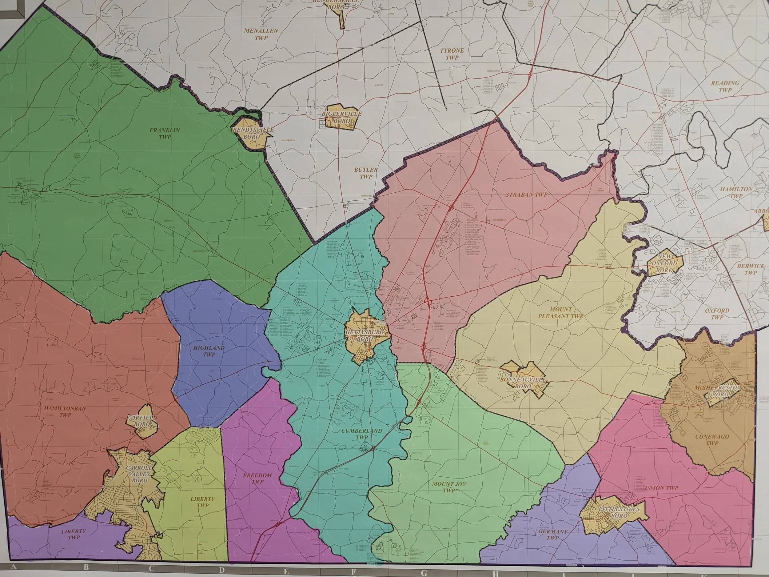 Map showing neighborhoods and townships with different colors and boundary lines, including labels of place names like Pittsburgh, McSherrystown, Carroll Valley, and New Oxford.