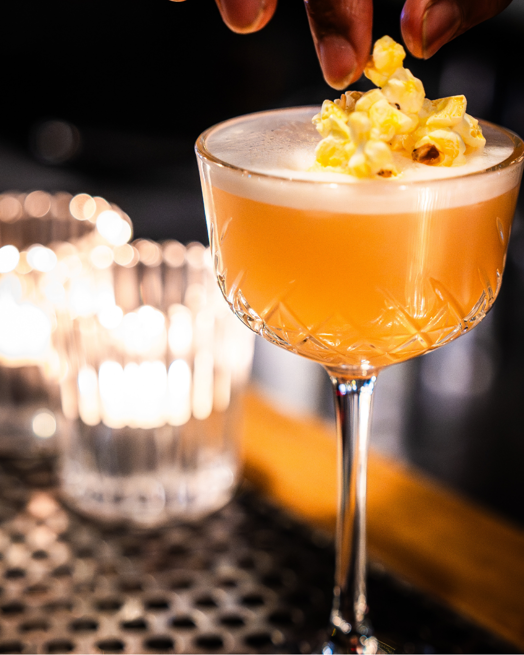 At Grandma’s House signature cocktail with bourbon, macadamia, wattleseed liqueur, popcorn syrup and lemon at Little Red’s Bar.