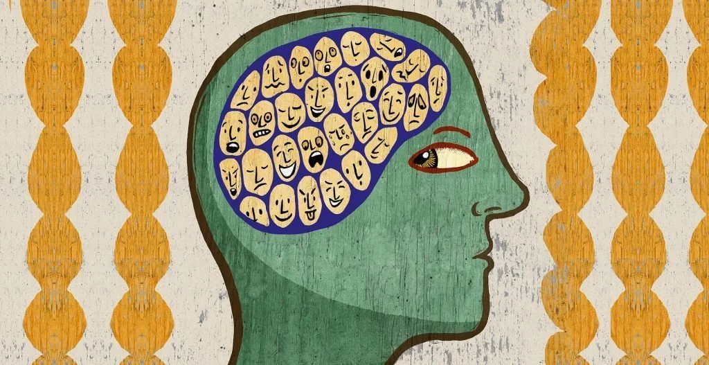 Illustration of a human head in profile with a green face and detailed eye, showing a brain filled with various expressive faces.