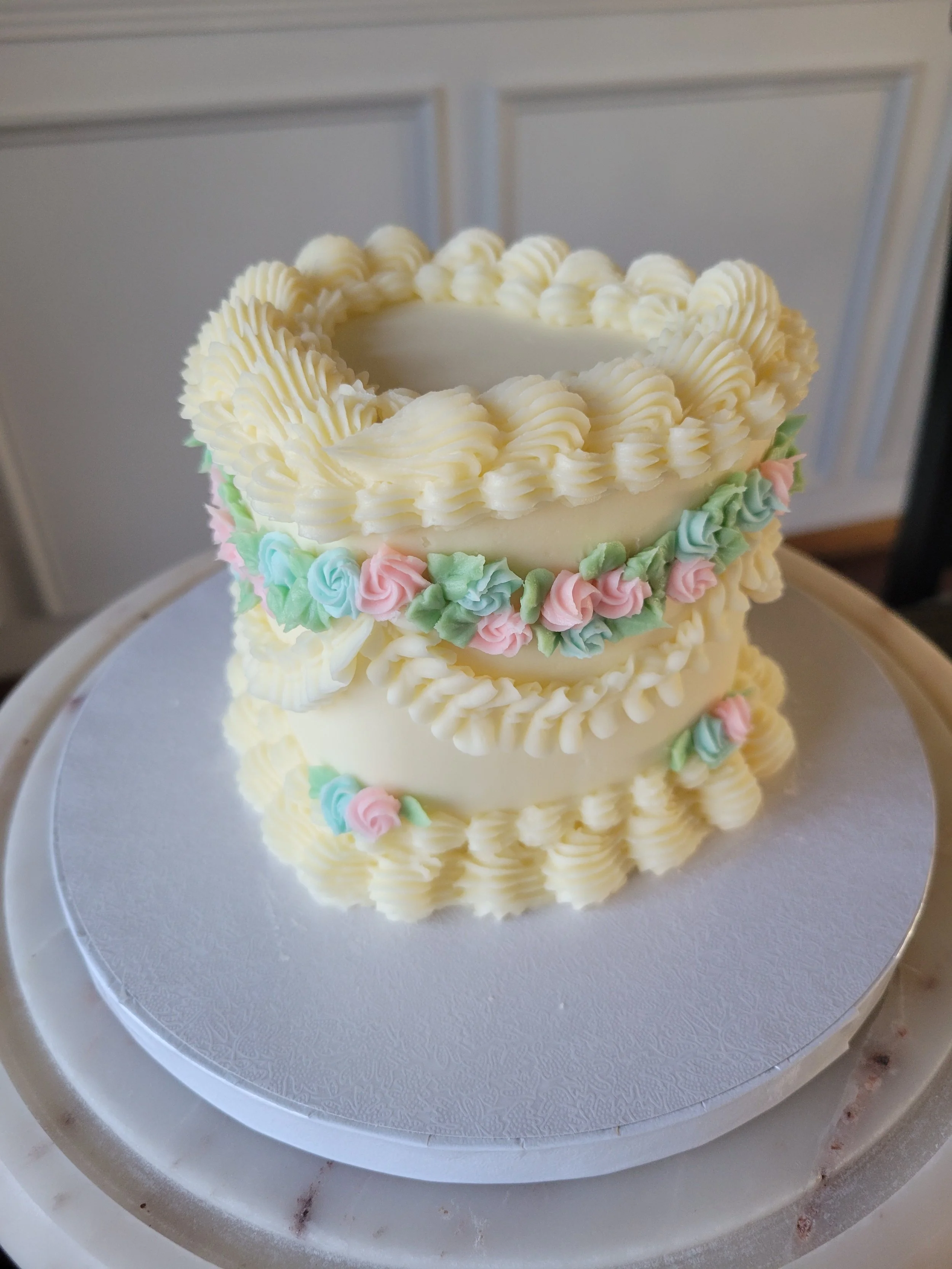 Vintage-inspired Lambeth cakes in Rochester, MN with intricate piping, layered textures, and a timeless, romantic aesthetic. Perfect for birthdays and statement celebrations.