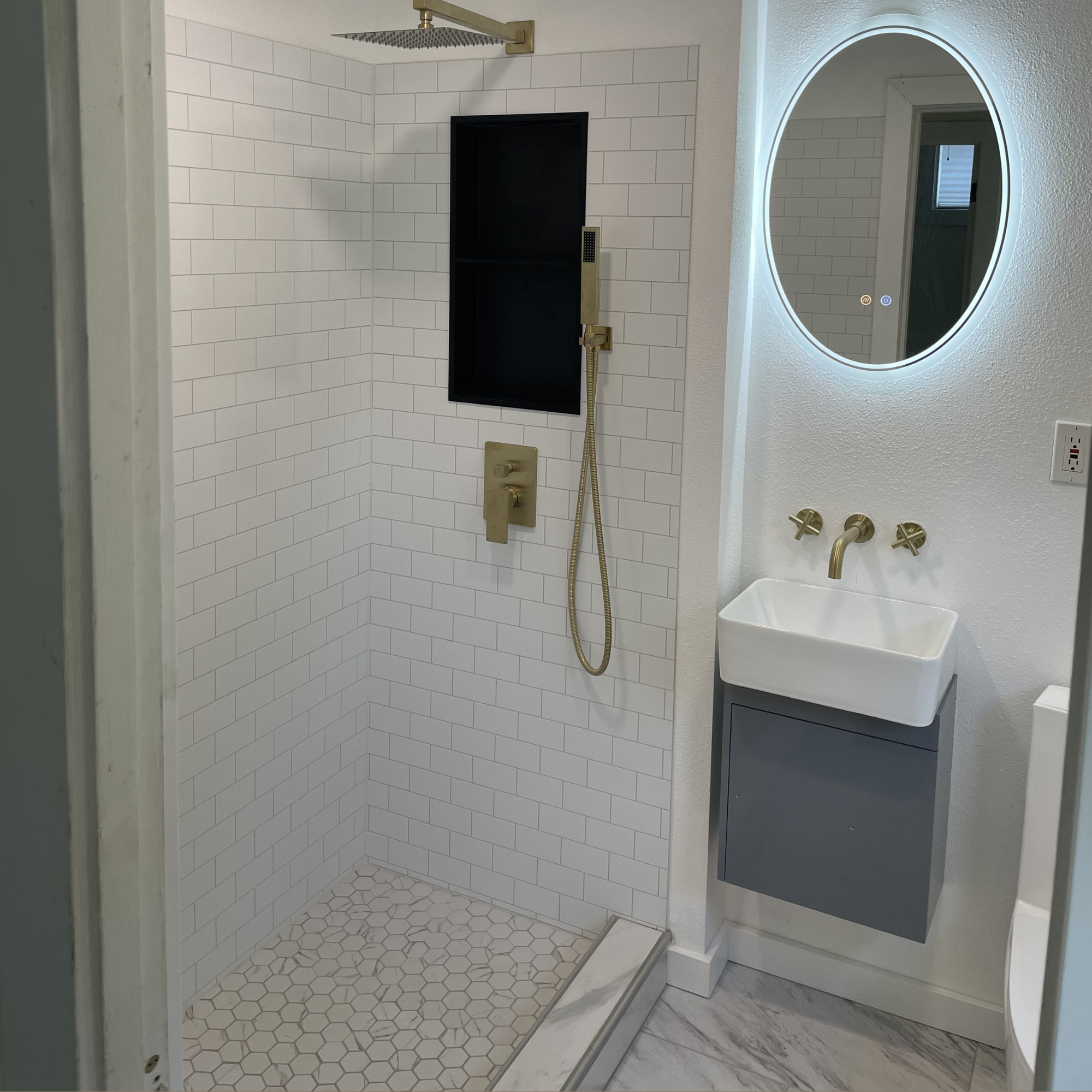 Bathroom- floating sink and shower