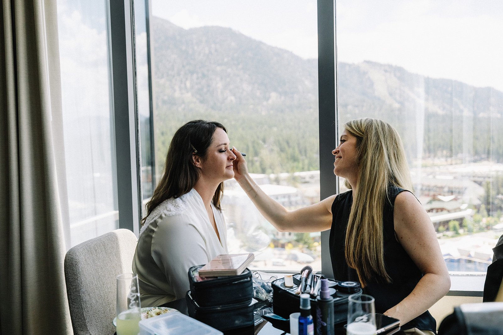 Bride getting makeup done at Caesars Republic before her Lake Tahoe elopement.jpg