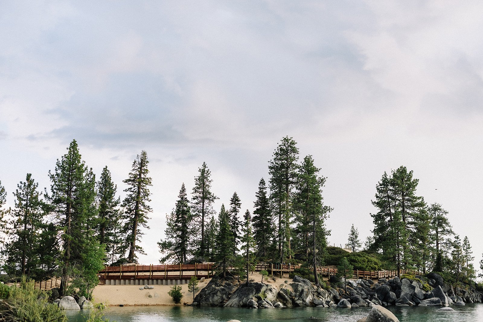 couple exchanging vows Sand Harbor beach Tahoe (2).jpg