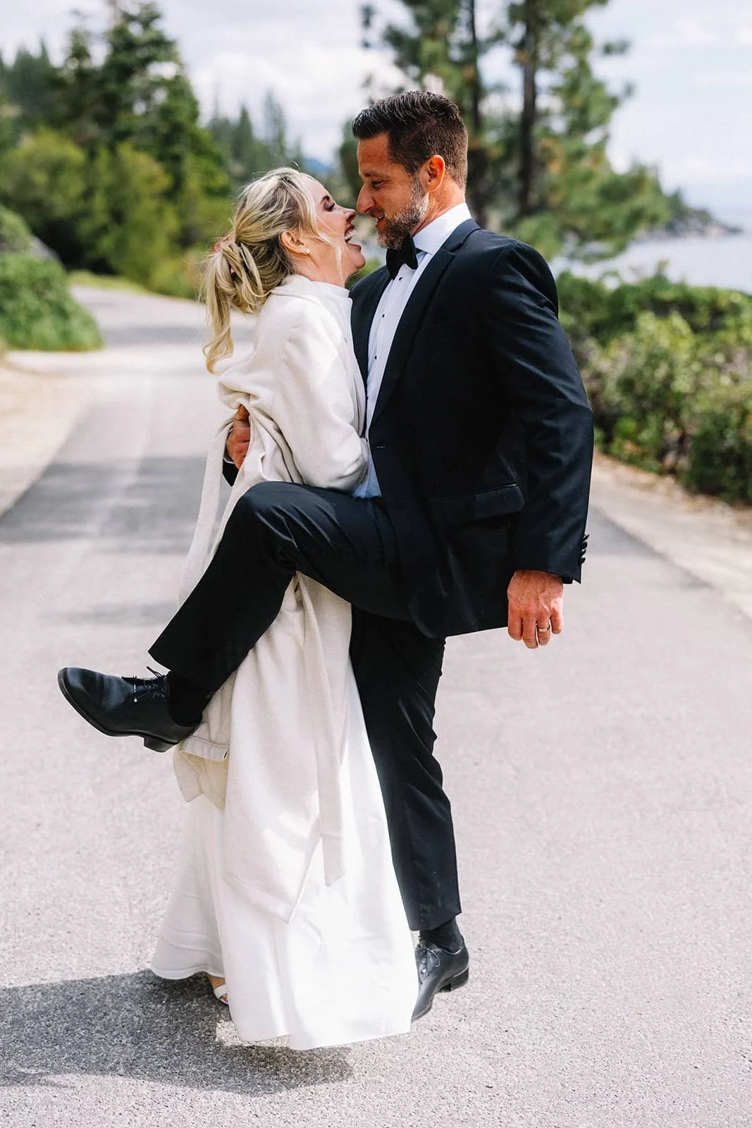 Bride and Groom having fun in Lake Tahoe after their ceremony