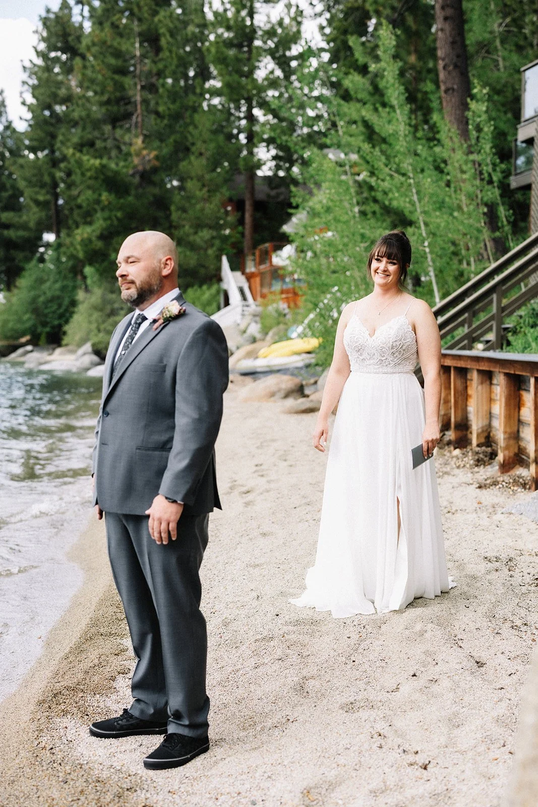 bide and groom first look on beach in Lake Tahoe.jpg