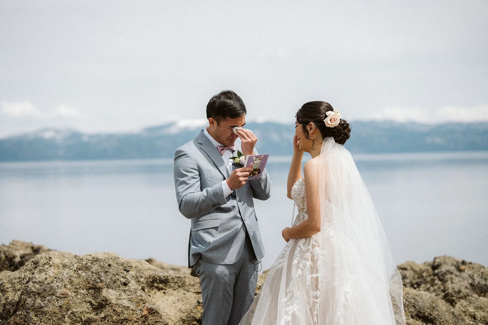 Groom emotional reading vows during Eagle Rock elopement ceremony, Lake Tahoe — AJ Photography