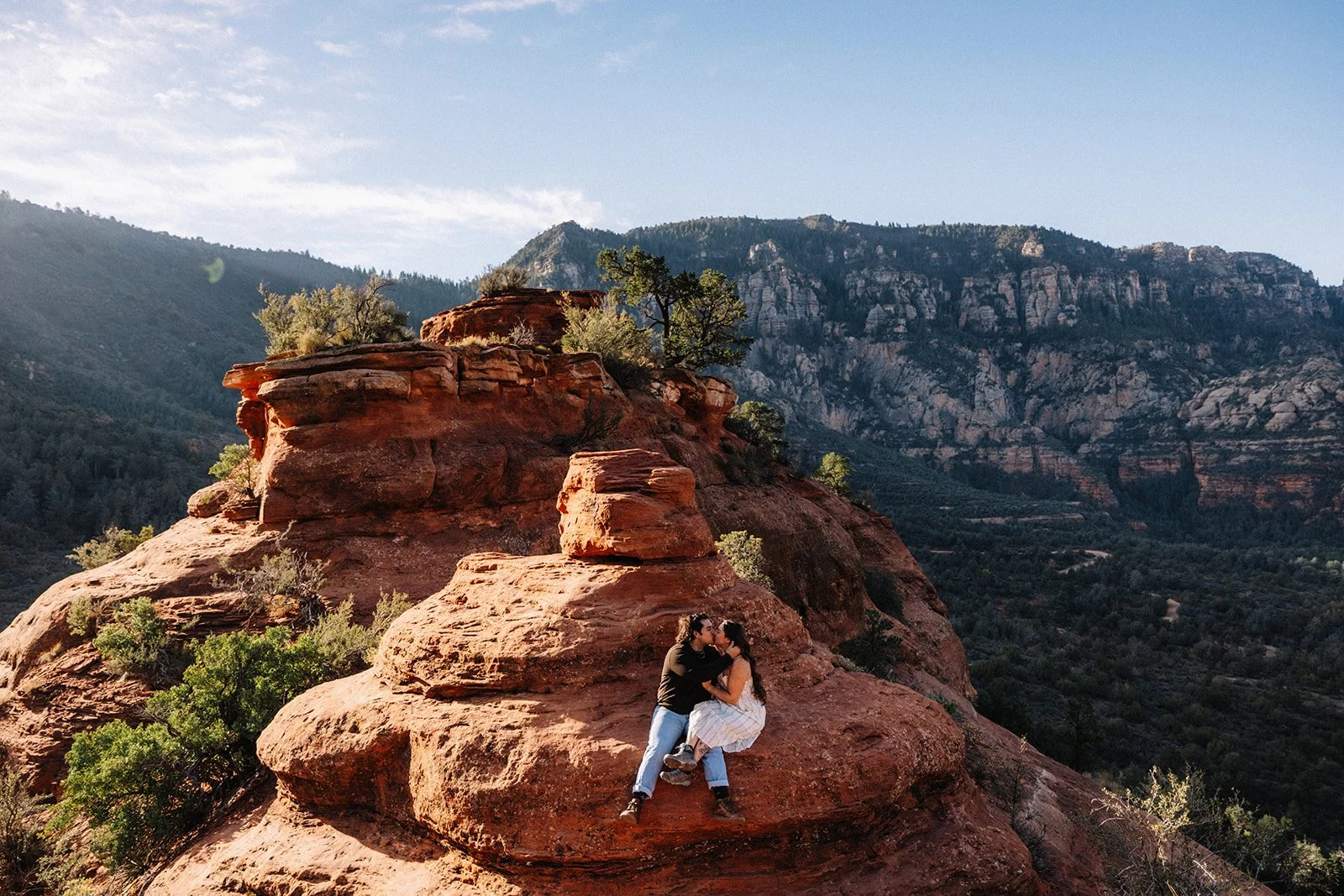 Couple at Merry Go Round Sedona Sunrise - Sedona engagement photographer AJ Photography