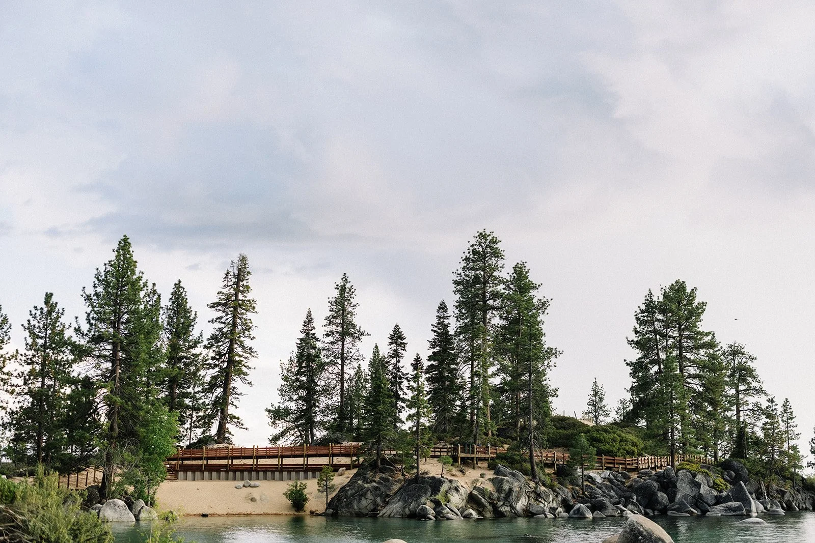 couple exchanging vows Sand Harbor beach Tahoe (2).jpg