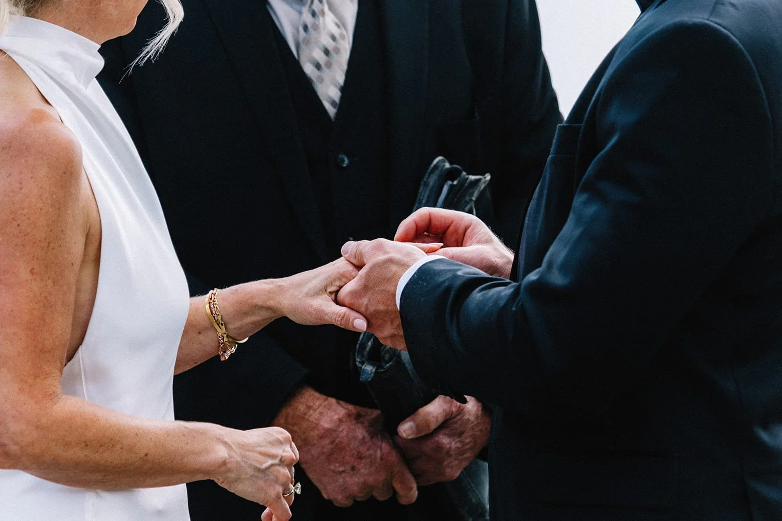 Exchanging rings during wedding ceremony.jpg
