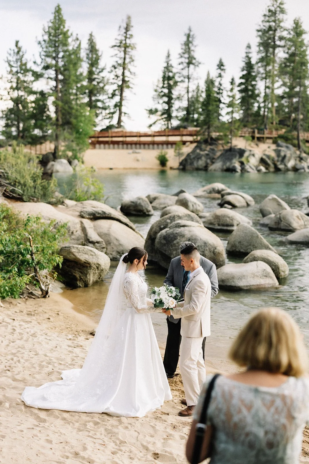couple exchanging vows Sand Harbor beach Tahoe (4).jpg