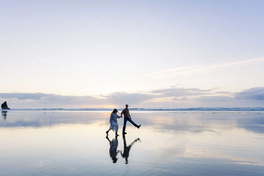 Couple at Cannon beach sunset - Oregon coast engagement AJ Photography
