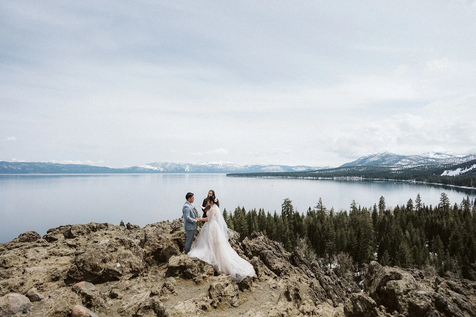 Eagle Rock elopement ceremony overlooking Lake Tahoe with snow-capped Sierra Nevada — AJ Photography