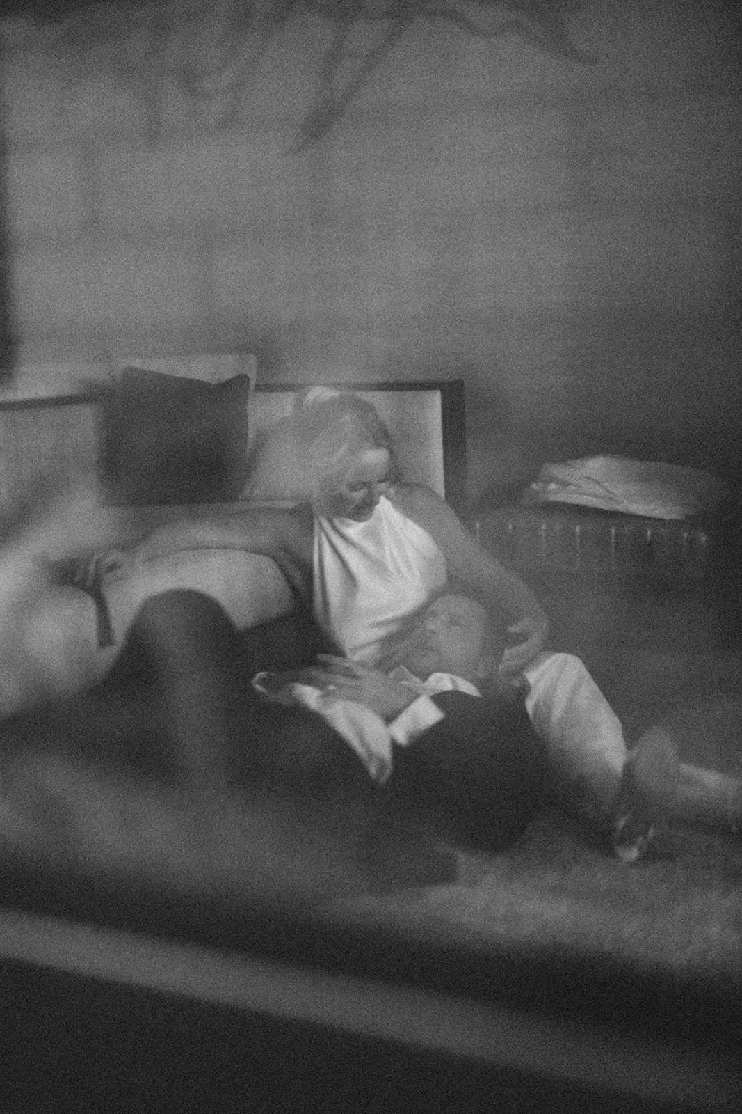 Bride resting her head back, laughing, before her Lake Tahoe wedding.jpg