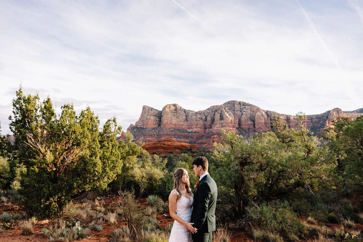 Couple at sunrise Sedona elopement by AJ Photography