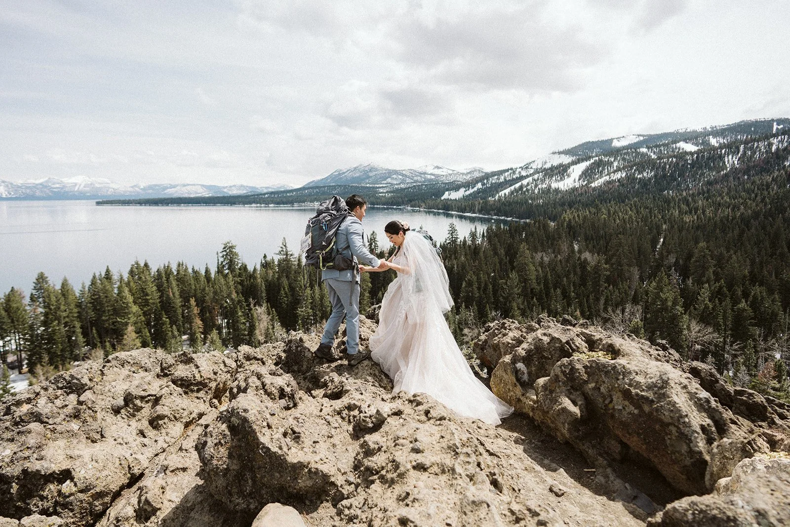 Bride and groom during lakeside elopement ceremony at Eagle Rock, Lake Tahoe — AJ Photography