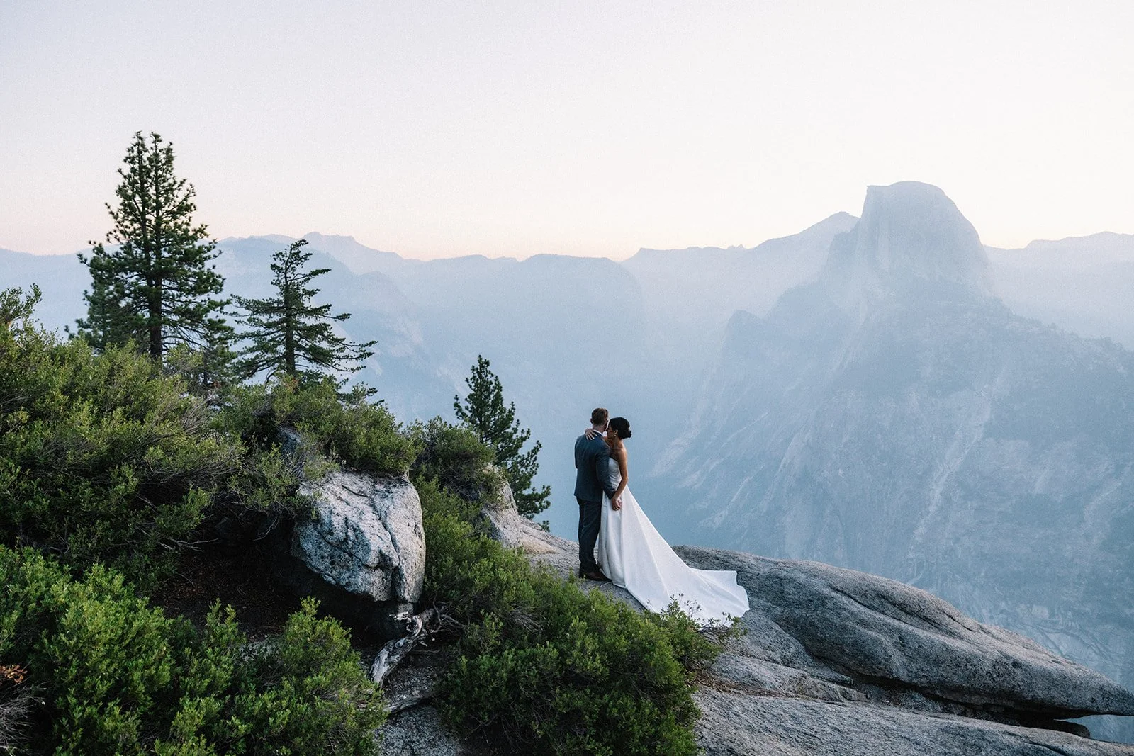 Couple at Glacier Point Sunrise - Yosemite Elopement photographer AJ Photography