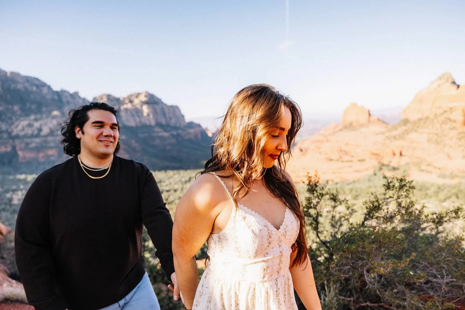 Engagement session in Sedona, AZ couple walking
