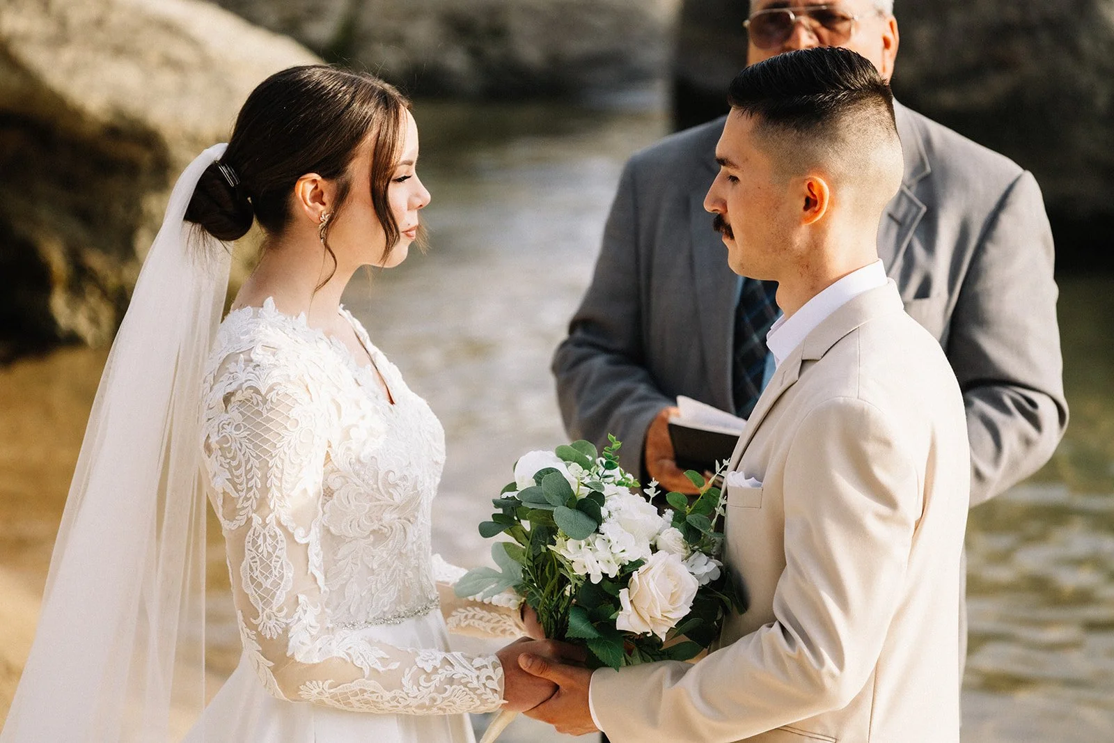 couple exchanging vows Sand Harbor beach Tahoe (3).jpg