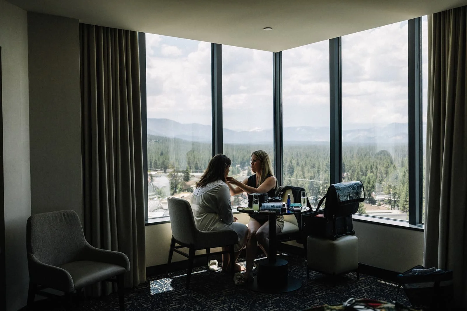 wide shot of bride getting ready in lake tahoe.jpg