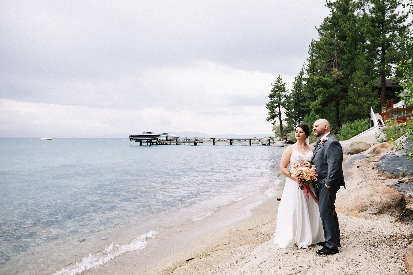 Bride and groom portrait on Lake Tahoe beach.jpg