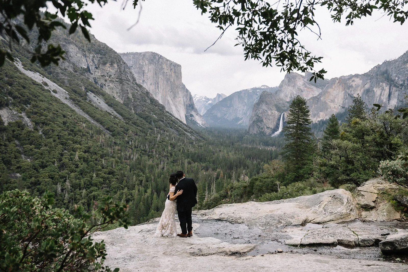 Couple at Tunnel View sunset - Yosemite elopement photographer AJ Photography
