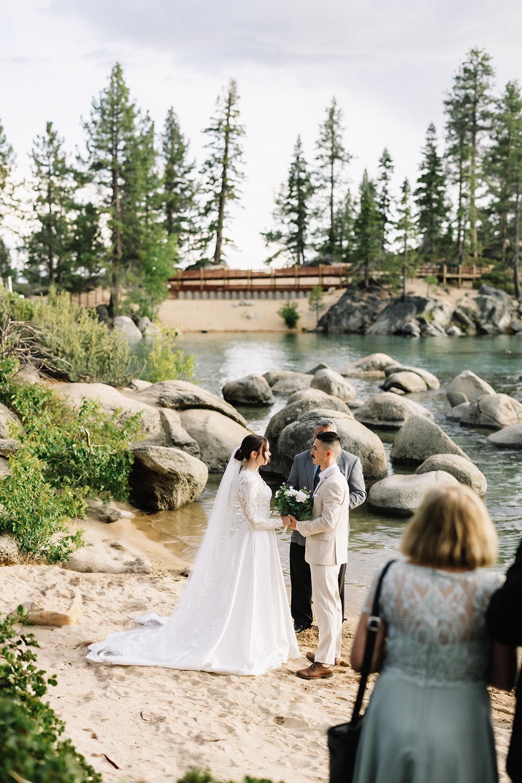 couple exchanging vows Sand Harbor beach Tahoe (1).jpg