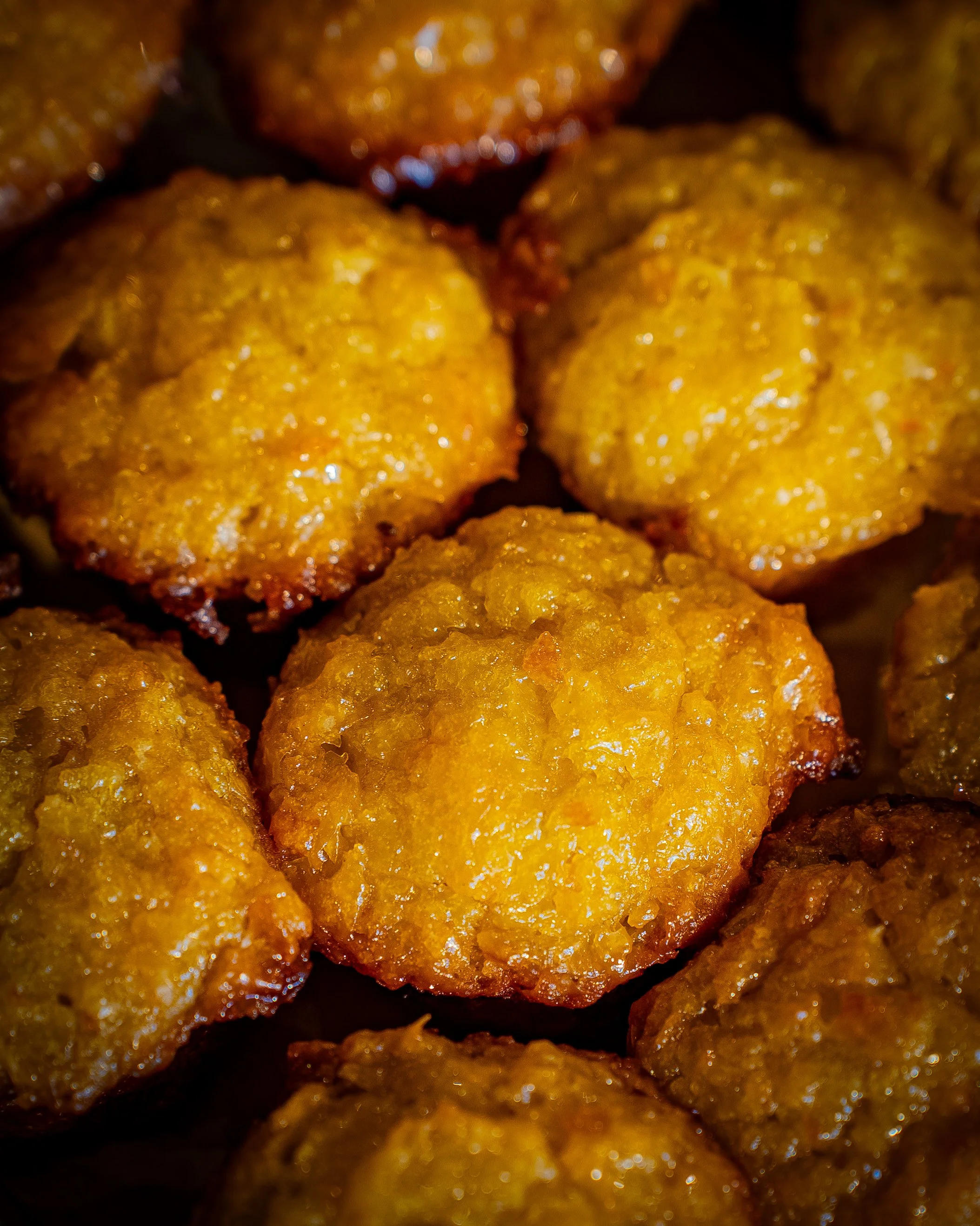 Close-up of fried chicken nuggets with a golden-brown crispy exterior.