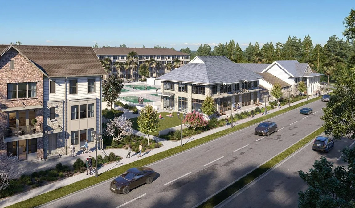 LC Ingleside with multi-story buildings, a street with parked cars, outdoor rec, green spaces with trees and people walking.