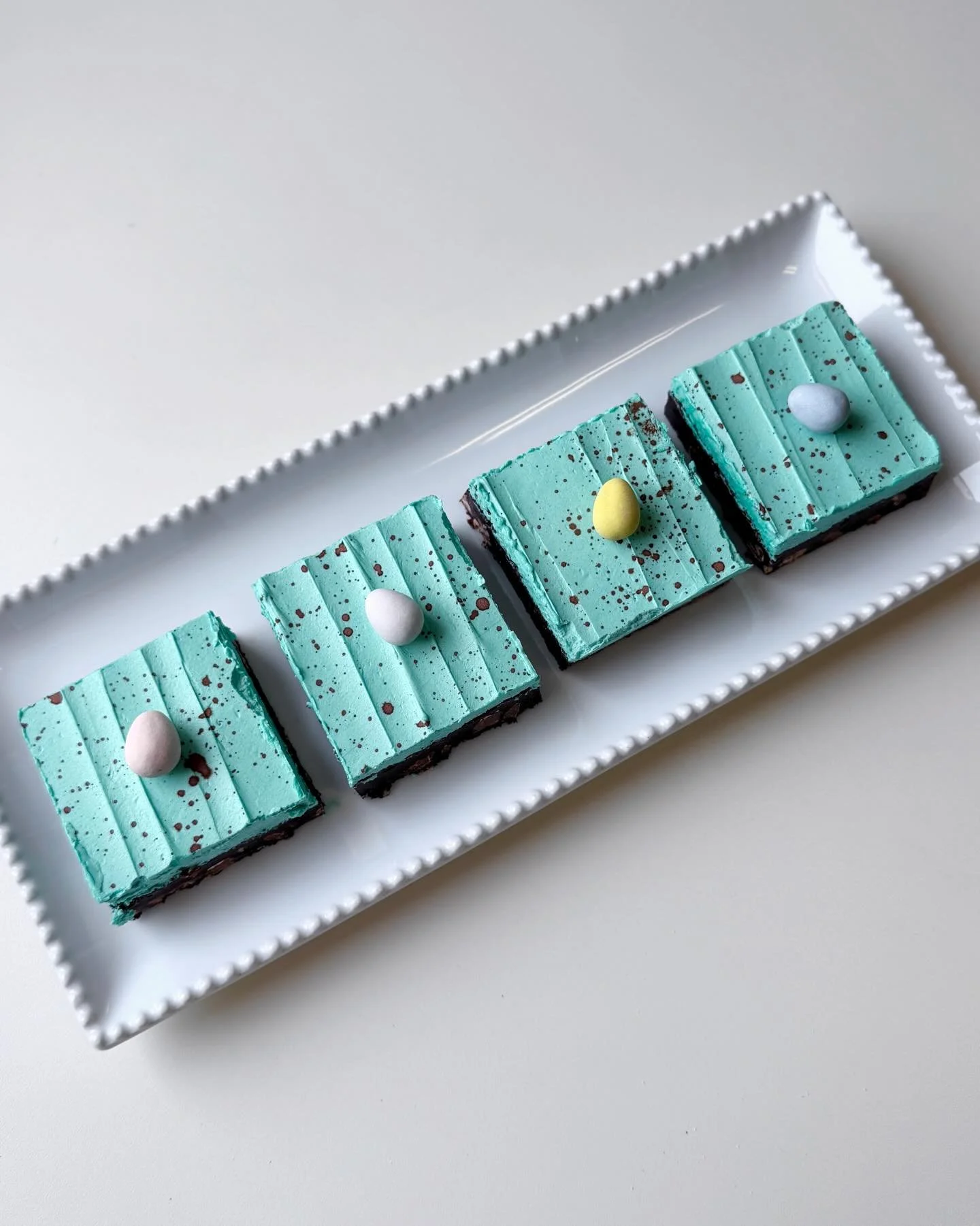 Mini egg brownies might be the cutest thing to come out of the bakery in a long time. I&rsquo;m obsessed. 

Our classic brownies filled with chopped mini eggs and topped with vanilla buttercream. Festive and perfect your Easter dessert table. 🪺🐰🐣
