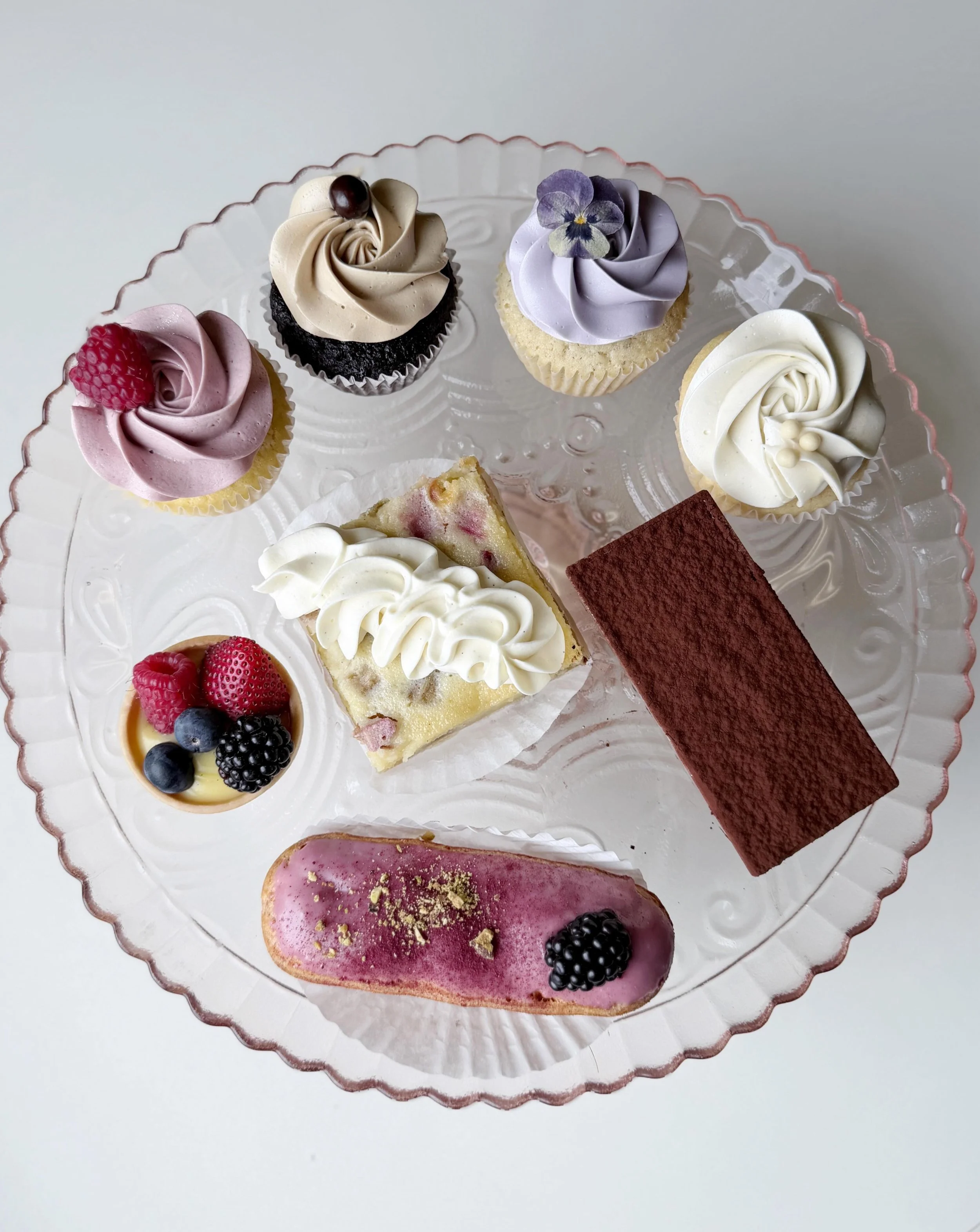 You guys have kept me so busy this morning I haven&rsquo;t had time to post until now! The case is still FULL of all kinds of treats and gifts. Build your own assortment for Mom or grab one of the adorable mini cakes, box of chocolate dipped strawber