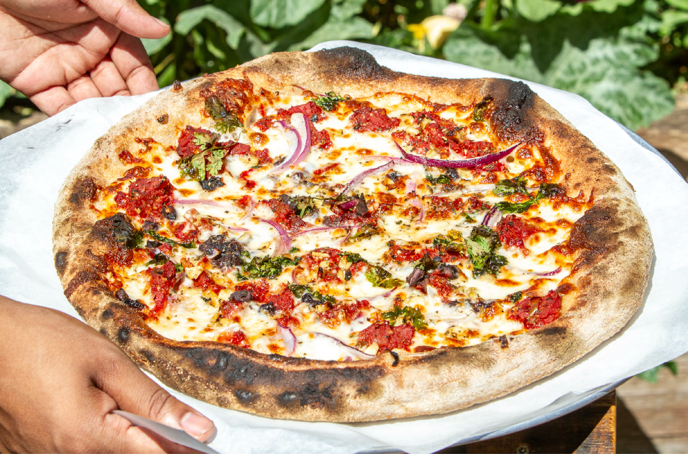 Photo of a signature full of life flatbread pizza