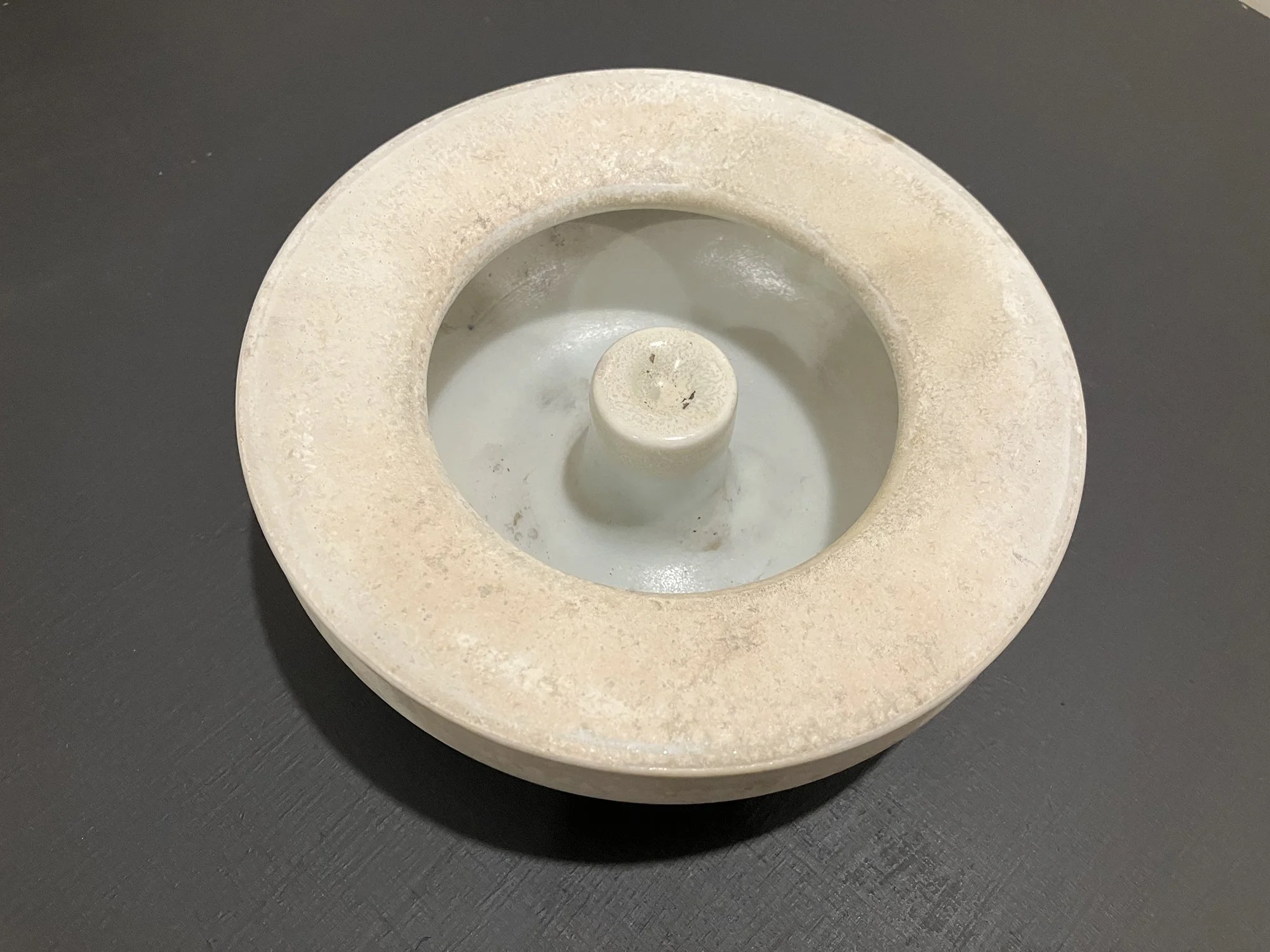 Mark Churchill,
Untitled,
2020, Porcelain with celadon and matte crystalline glaze, 2 x 5 x 5 inches
