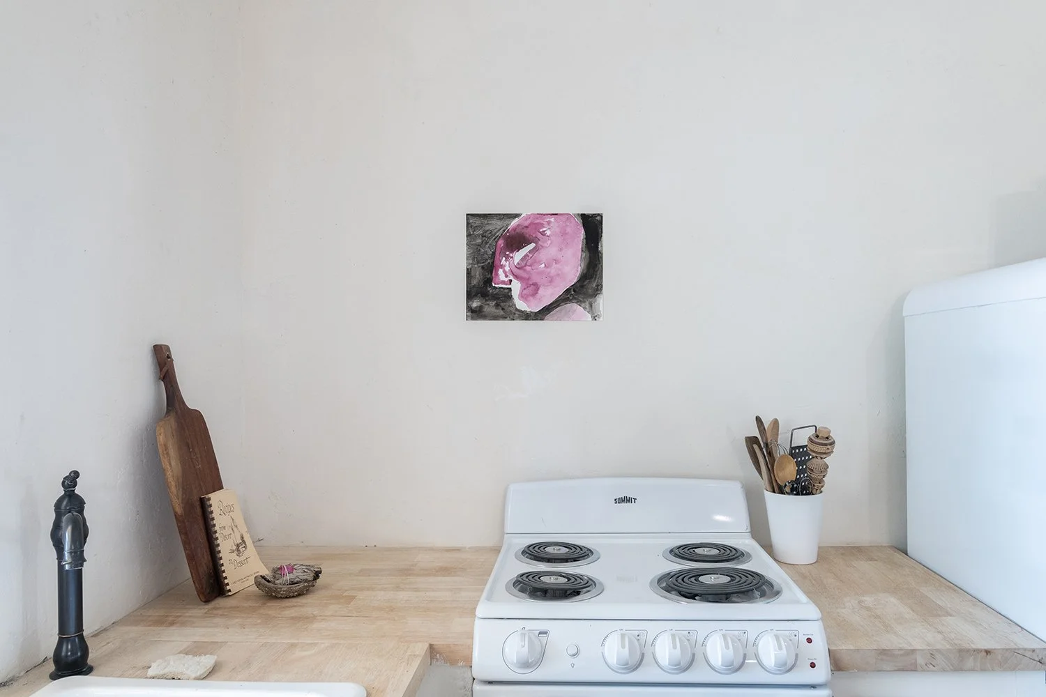 Installation view with Paul Whiting,  Untitled , 2024, gesso and dispersion on paper,  11 x 14 inches