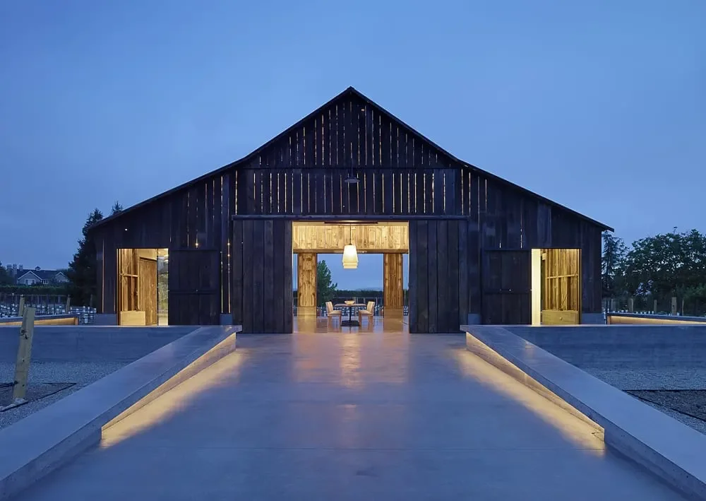 Large driveway in front of a barn